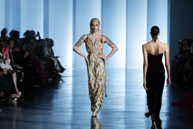 US model, makeup artist and drag queen Miss Fame presents a creation for Rahul Mishra during the Women's Haute-Couture Spring/Summer 2025 Fashion Week in Paris on January 27, 2025. (Photo by Thibaud MORITZ / AFP)