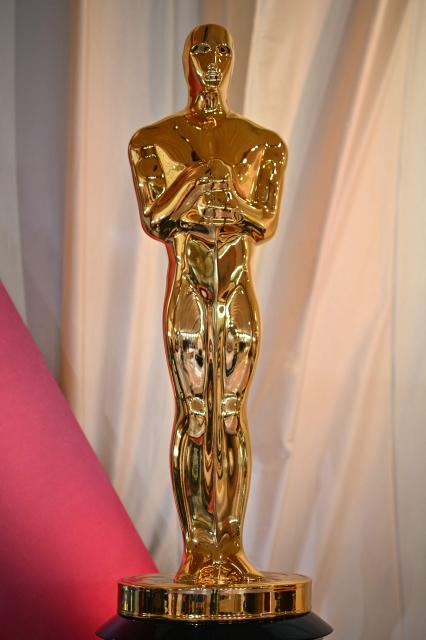 An Oscar statue is seen as preparations are made for the 97th Annual Academy Awards outside the Dolby Theatre in Hollywood, California, on February 28, 2025. (Photo by ANGELA WEISS / AFP)