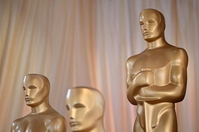 Oscar statues are seen as preparations are made for the 97th Annual Academy Awards outside the Dolby Theatre in Hollywood, California, on February 28, 2025. (Photo by ANGELA WEISS / AFP)