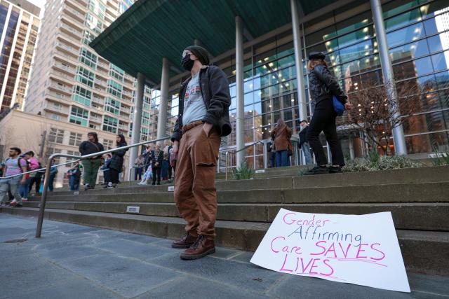 Supporters of gender-affirming care gather outside the US District Court for the Western District of Washington in Seattle, Washington, February 28, 2025. Brown spoke to the press after US District Judge Lauren King announced they are deliberating on whether to extend a pause on US President Donald Trump’s executive order attacking gender-affirming care for youth. (Photo by Jason Redmond / AFP)