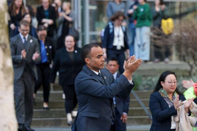 Washington State Attorney General Nick Brown acknowledges gathered supporters outside the US District Court for the Western District of Washington in Seattle, Washington, February 28, 2025. Brown spoke to the press following a hearing on the state’s request for a preliminary injunction against US President Donald Trump’s executive order attacking gender-affirming care for youth. (Photo by Jason Redmond / AFP)