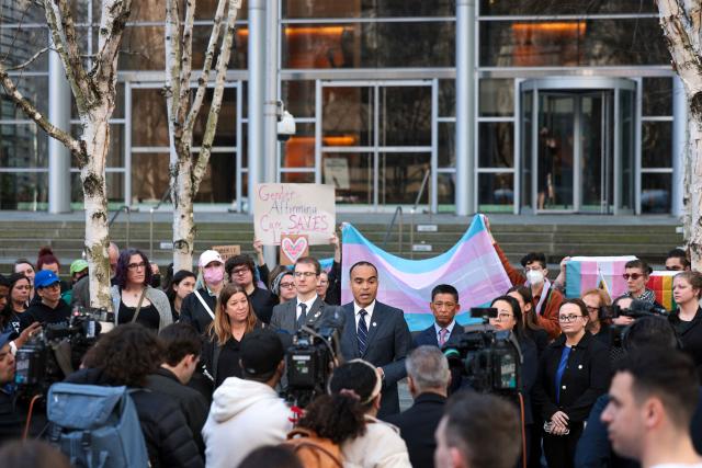 Washington State Attorney General Nick Brown speaks to the media outside the US District Court for the Western District of Washington in Seattle, Washington, February 28, 2025. Brown spoke to the press following a hearing on the state’s request for a preliminary injunction against US President Donald Trump’s executive order attacking gender-affirming care for youth. (Photo by Jason Redmond / AFP)