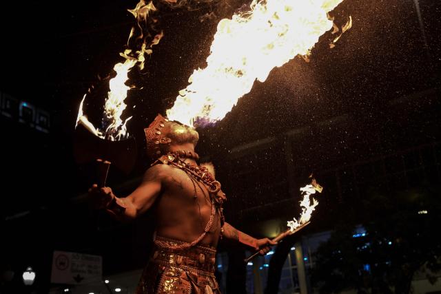 A member of the Ilu Oba de Min percussion performs during the street carnival in Sao Paulo, Brazil on February 28, 2025. Ilu Oba de Min known for embracing African and Afro-Brazilian culture, is one of the culturally-focused carnival street parties of Sao Paulo. (Photo by Nelson ALMEIDA / AFP)