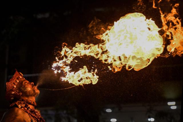 A member of the Ilu Oba de Min percussion performs during the street carnival in Sao Paulo, Brazil on February 28, 2025. Ilu Oba de Min known for embracing African and Afro-Brazilian culture, is one of the culturally-focused carnival street parties of Sao Paulo. (Photo by Nelson ALMEIDA / AFP)