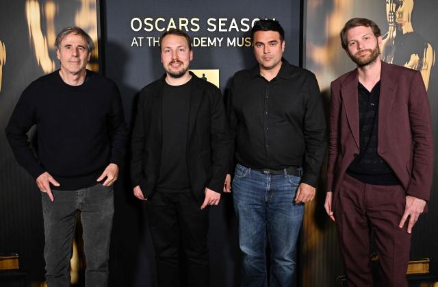 (L/R) Brazilian director Walter Salles, Latvian animator and director Gints Zilbalodis, producer Mani Tilgner and Swedish-Polish film director Magnus von Horn attend the Oscar Week: International Feature Film event at the Academy Museum of Motion Pictures in Los Angeles on February 28, 2025. (Photo by Robyn Beck / AFP)