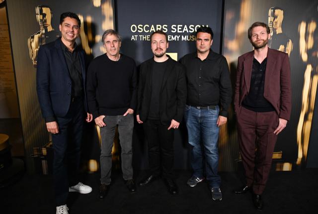 (L/R) Moderator Rajendra Roy, Brazilian director Walter Salles, Latvian animator and director Gints Zilbalodis, producer Mani Tilgner and Swedish-Polish film director Magnus von Horn attend the Oscar Week: International Feature Film event at the Academy Museum of Motion Pictures in Los Angeles on February 28, 2025. (Photo by Robyn Beck / AFP)