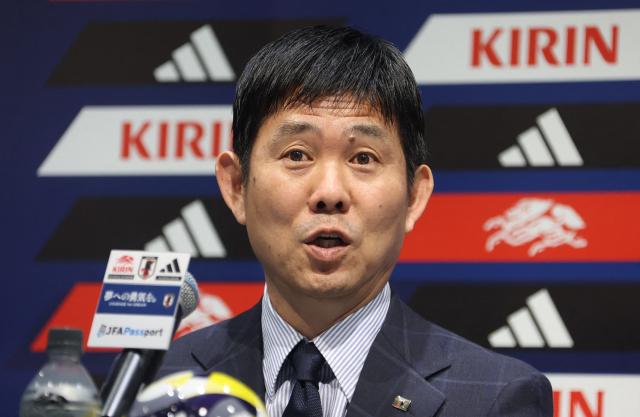 Japan's national team coach Hajime Moriyasu speaks during a press conference in Chiba on March 13, 2025. Liverpool's Wataru Endo and Brighton's Kaoru Mitoma were named in Japan's squad on March 13 as they look to become the first team to qualify for the 2026 World Cup. (Photo by JIJI Press / AFP) / Japan OUT