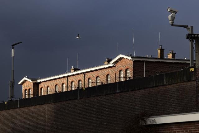 A photo shows the exterior of the Hague Penitentiary Institution prison, a day after Philippine former president Rodrigo Duterte's arrival in the Netherlands, following his arrest on an ICC warrant tied to his deadly crackdown on drugs, in Scheveningen, on March 13, 2025. The 79-year-old faces a charge of "the crime against humanity of murder", according to the ICC, for a crackdown that rights groups estimate killed tens of thousands of mostly poor men, often without proof they were linked to drugs. (Photo by Ramon van Flymen / ANP / AFP) / Netherlands OUT