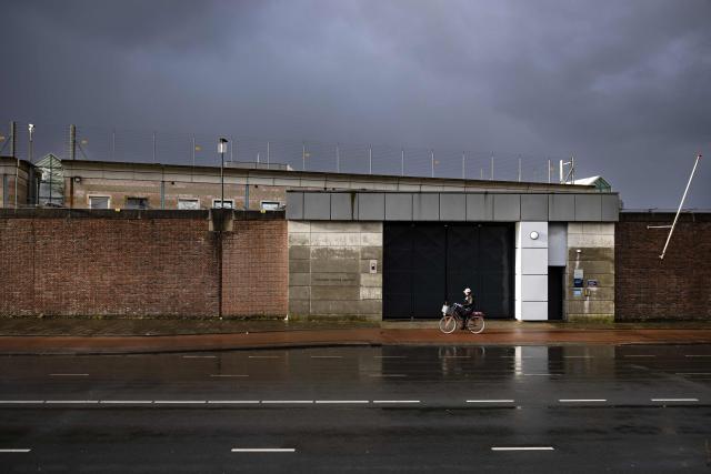 A photo shows the exterior of the Hague Penitentiary Institution prison, a day after Philippine former president Rodrigo Duterte's arrival in the Netherlands, following his arrest on an ICC warrant tied to his deadly crackdown on drugs, in Scheveningen, on March 13, 2025. The 79-year-old faces a charge of "the crime against humanity of murder", according to the ICC, for a crackdown that rights groups estimate killed tens of thousands of mostly poor men, often without proof they were linked to drugs. (Photo by Ramon van Flymen / ANP / AFP) / Netherlands OUT