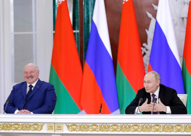 Russia's President Vladimir Putin and Belarus' President Alexander Lukashenko attend a press conference following their meeting at the Kremlin in Moscow on March 13, 2025. (Photo by Maxim Shemetov / POOL / AFP)