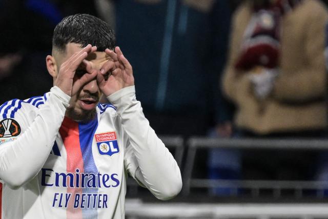 Lyon’s Georgian forward #69 Georges Mikautadze celebrates after scoring his team's first goal during the second leg last 16 UEFA Europa League football match between Olympique Lyonnais (OL) (FRA) and Steaua Bucharest FCSB (ROM) at The Groupama Stadium in Decines-Charpieu, south-eastern France on March 13, 2025. (Photo by JEAN-PHILIPPE KSIAZEK / AFP)