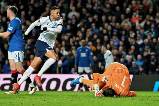 Rangers' English goalkeeper #01 Jack Butland concedes the teams first goal during the UEFA Europa League second-leg round of 16 football match between Rangers and Fenerbahce SK at the Ibrox Stadium in Glasgow on March 13, 2025. (Photo by ANDY BUCHANAN / AFP)