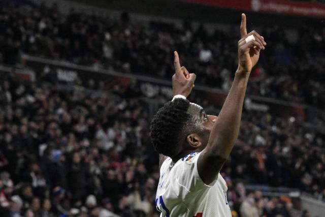 Lyon's Ghanaian forward celebrates scoring his team's second goal #37 Ernest Nuamah during the second leg of last 16 UEFA Europa League football match between Olympique Lyonnais (OL) (FRA) and Steaua Bucharest FCSB (ROM) at the Parc Olympique Lyonnais in Decines-Charpieu, south-eastern France on March 13, 2025. (Photo by JEAN-PHILIPPE KSIAZEK / AFP)