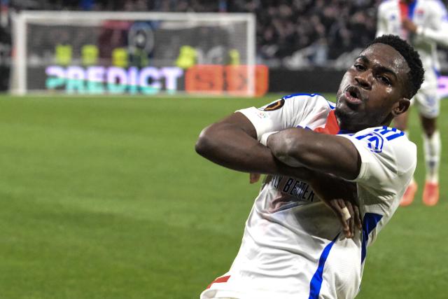 Lyon's Ghanaian forward #37 Ernest Nuamah celebrates scoring his team's second goal during the second leg of last 16 UEFA Europa League football match between Olympique Lyonnais (OL) (FRA) and Steaua Bucharest FCSB (ROM) at the Parc Olympique Lyonnais in Decines-Charpieu, south-eastern France on March 13, 2025. (Photo by JEAN-PHILIPPE KSIAZEK / AFP)