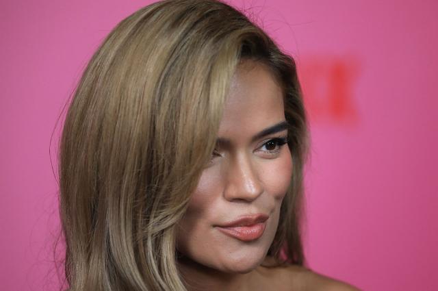 Colombian singer Karol G gestures during the launch of her documentary "Mañana Fue Muy Bonito" (Tomorrow Was Very Nice) in Medellin, Colombia, on April 30, 2025. The documentary will be broadcast on the streaming platform Netflix on May 8, 2025. (Photo by JAIME SALDARRIAGA / AFP)