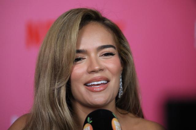 Colombian singer Karol G speaks during the launch of her documentary "Mañana Fue Muy Bonito" (Tomorrow Was Very Nice) in Medellin, Colombia, on April 30, 2025. The documentary will be broadcast on the streaming platform Netflix on May 8, 2025. (Photo by JAIME SALDARRIAGA / AFP)