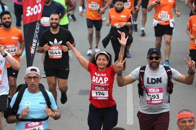 Competitors take part in the annual Beirut Marathon, in the Lebanese capital, on April 1, 2025. (Photo by Ibrahim AMRO / AFP)