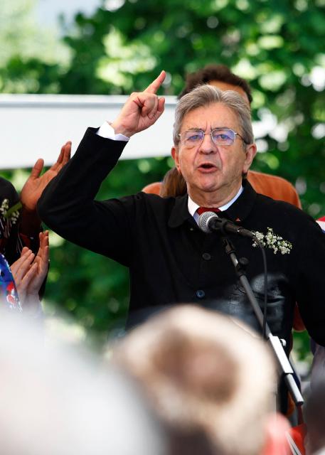 Founder of French left-wing La France Insoumise (LFI) party Jean-Luc Melenchon delivers a speech during a May Day (Labour Day) rally, marking International Workers' Day, in Paris, on May 1, 2025. (Photo by Ian LANGSDON / AFP)