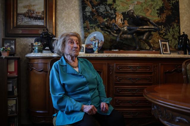 (FILES) French author Marie Vaislic, who was deported to a concentration camp in Germany during the World War ll at the age of 14, poses for a photo at her home in Toulouse, southwestern France, on February 21, 2024. Marie Vaislic, a Holocaust survivor who fought to ensure that the horror of the Holocaust would never be forgotten, died on May 1, 2025 in Toulouse at the age of 94, her son Claude Vaislic told AFP, confirming a report in the magazine Le Point. (Photo by Valentine CHAPUIS / AFP)