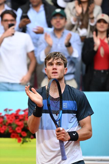 Great Britain's Jack Draper celebrates winning against Italy's Matteo Arnaldi in their 2025 ATP Tour Madrid Open tennis tournament quarter-final singles match at the Caja Magica in Madrid, on May 1, 2025. (Photo by JAVIER SORIANO / AFP)