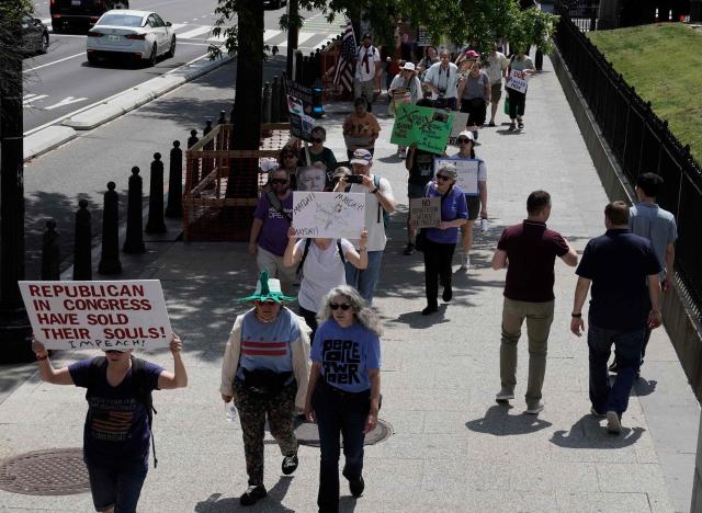 Protesters march near the White House during a Free Kilmar Abrego Garcia Now march rally in Washington, DC on May 1, 2025. Abrego Garcia was detained in Maryland in February 2025 and expelled to El Salvador along with 238 Venezuelans and 22 fellow Salvadorans who were deported shortly after President Donald Trump invoked a rarely-used wartime authority. (Photo by Oliver Contreras / AFP)