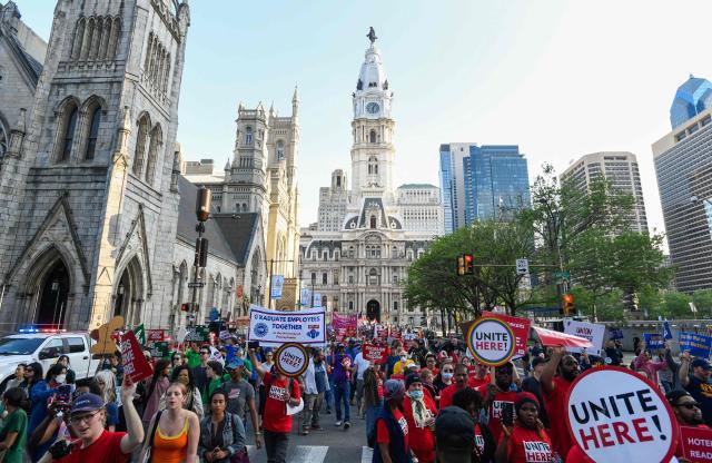 People march near Philadelphia City Hall during the “For the Workers, Not the Billionaires May Day Rally” in Philadelphia, Pennsylvania on May 1, 2025. US Senator Bernie Sanders addressed the protesters who marched and participated in an act of civil disobedience. (Photo by Matthew Hatcher / AFP)