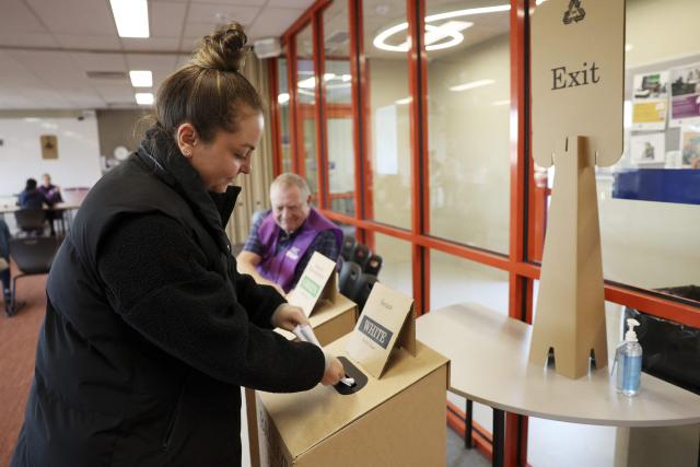 A voter casts her ballot in Australia’s general election at a polling station in Melbourne on May 3, 2025. (Photo by Martin KEEP / AFP)