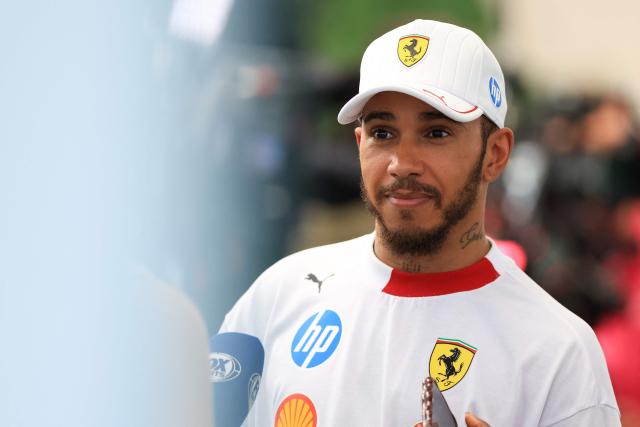 Ferrari's British driver Lewis Hamilton speaks during a television interview following the qualifying session for the 2025 Miami Formula One Grand Prix at Miami International Autodrome in Miami Gardens, Florida, on May 3, 2025. (Photo by CHARLY TRIBALLEAU / AFP)