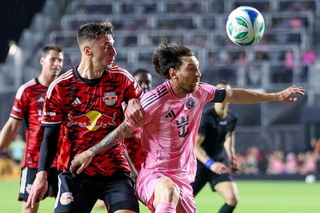 Inter Miami's Argentine forward #10 Lionel Messi fights for the ball with the New York Red Bulls' Swedish defender #03 Noah Eile during the MLS football match between Inter Miami FC and the New York Red Bulls, at Chase Stadium in Fort Lauderdale, Florida on May 3, 2025. (Photo by Chris Arjoon / AFP)