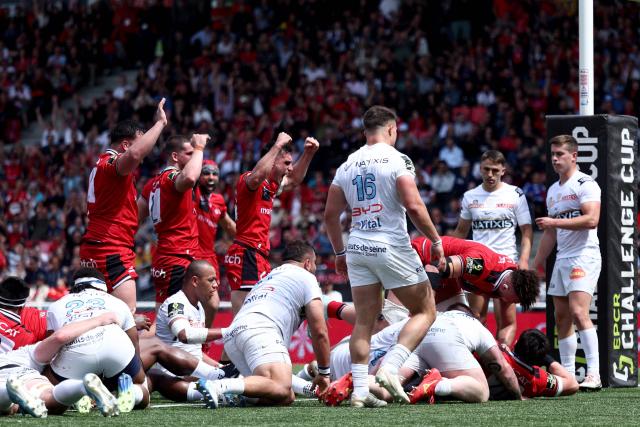 Lyon’s players celebrate after scoring a try during the European Rugby Challenge Cup semi-final rugby union match between Lyon Olympique Universitaire Rugby (LOU) and Racing 92 at the Gerland stadium in Lyon, central-eastern France on May 4, 2025. (Photo by Alex MARTIN / AFP)