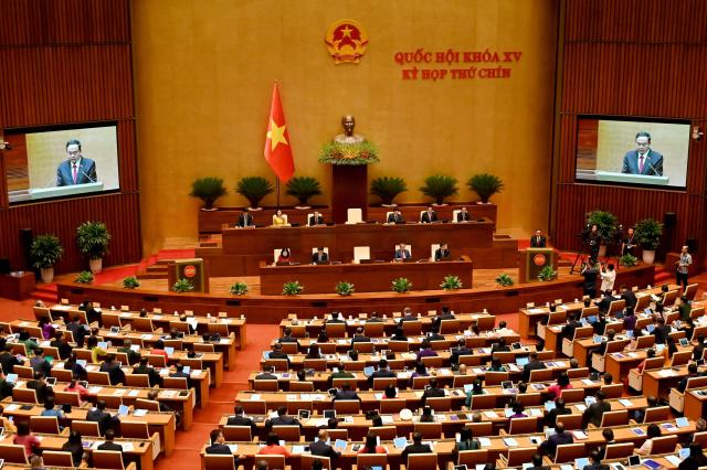 Vietnam's members of parliament attend the National Assembly's summer session opening in Hanoi on May 5, 2025. (Photo by Nhac NGUYEN / AFP)