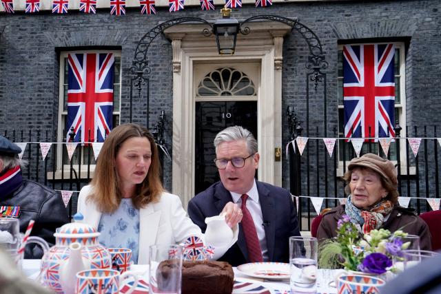 Britain's Prime Minister Keir Starmer hosts a street party alongside his wife Victoria Starmer in Downing Street on May 5, 2025 to celebrate the 80th anniversary of VE Day also known as Victory in Europe Day, marking the end of the Second World War in Europe. (Photo by Stefan Rousseau / POOL / AFP)