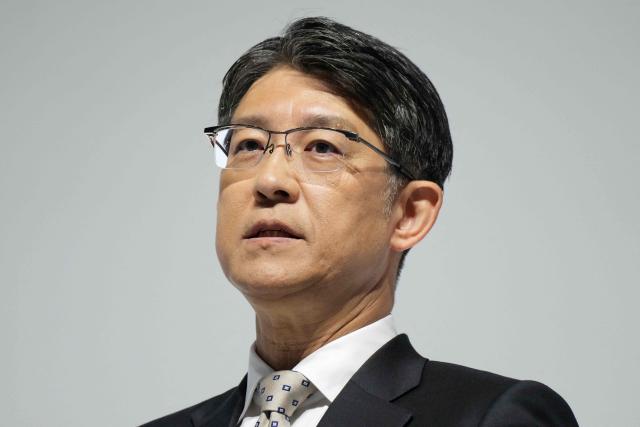 Toyota Motor President and CEO Koji Sato delivers a speech during a press briefing for the company's financial results in Tokyo on May 8, 2025. Japanese auto giant Toyota forecast a 35 percent year-on-year drop in net profit to 21.6 billion USD for the 2025-26 financial year. (Photo by Kazuhiro NOGI / AFP)