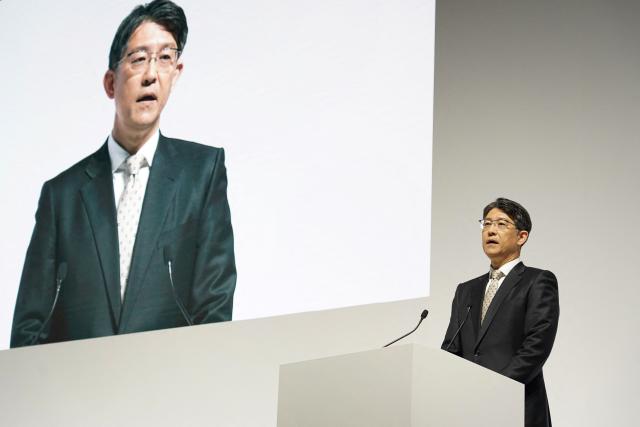 Toyota Motor President and CEO Koji Sato delivers a speech during a press briefing for the company's financial results in Tokyo on May 8, 2025. Japanese auto giant Toyota forecast a 35 percent year-on-year drop in net profit to 21.6 billion USD for the 2025-26 financial year. (Photo by Kazuhiro NOGI / AFP)