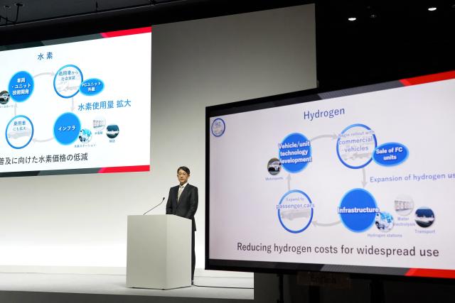 Toyota Motor President and CEO Koji Sato delivers a speech during a press briefing for the company's financial results in Tokyo on May 8, 2025. Japanese auto giant Toyota forecast a 35 percent year-on-year drop in net profit to 21.6 billion USD for the 2025-26 financial year. (Photo by Kazuhiro NOGI / AFP)