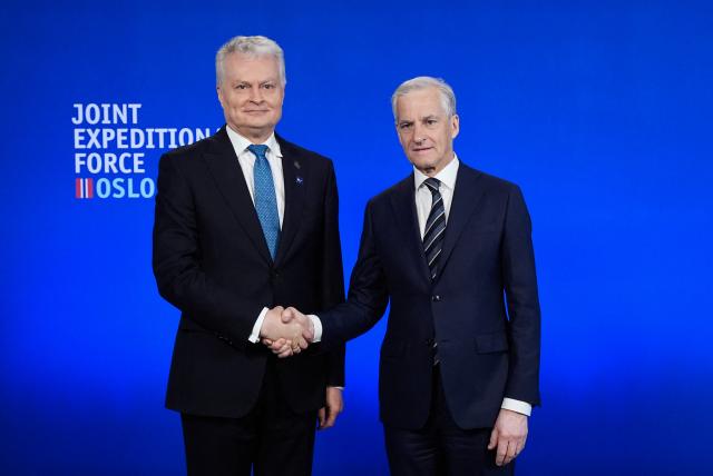 Norway's Prime Minister Jonas Gahr Store (R) greets Lithuania's President Gitanas Nauseda at the start of the annual Joint Expeditionary Force (JEF) Leaders' Summit in Oslo on May 9, 2025. From May 8-9, Norway hosts this year's summit for the members of the JEF coalition: UK, Denmark, Estonia, Finland, Iceland, Latvia, Lithuania, the Netherlands, Sweden and Norway. Their meeting will focus on the situation in Europe and regional cooperation on security challenges. (Photo by Lise Åserud / NTB / AFP) / Norway OUT