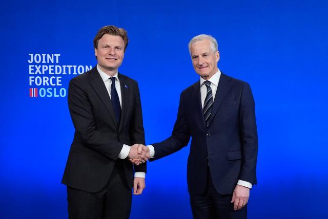 Norway's Prime Minister Jonas Gahr Store (R) greets Netherland's Defense Minister Ruben Brekelmans at the start of the annual Joint Expeditionary Force (JEF) Leaders' Summit in Oslo on May 9, 2025. From May 8-9, Norway hosts this year's summit for the members of the JEF coalition: UK, Denmark, Estonia, Finland, Iceland, Latvia, Lithuania, the Netherlands, Sweden and Norway. Their meeting will focus on the situation in Europe and regional cooperation on security challenges. (Photo by Lise Åserud / NTB / AFP) / Norway OUT