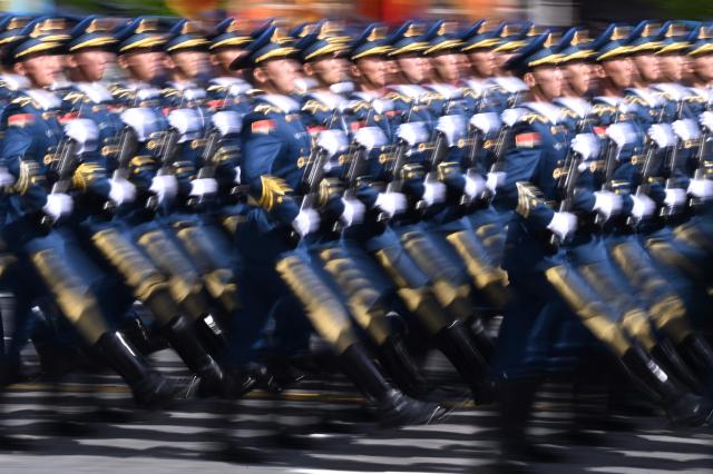 Chinese servicemen march on Red Square during the Victory Day military parade in central Moscow on May 9, 2025. Russia celebrates the 80th anniversary of the Soviet Union's victory over Nazi Germany in World War Two (WWII). (Photo by Kirill KUDRYAVTSEV / AFP)