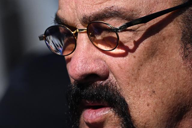 US actor Steven Seagal arrives to attend the Victory Day military parade at Red Square in central Moscow on May 9, 2025. Russia celebrates the 80th anniversary of the Soviet Union's victory over Nazi Germany in World War Two (WWII). (Photo by Kirill KUDRYAVTSEV / AFP)