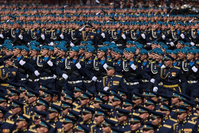 Russian servicemen march during the Victory Day military parade at Red Square in central Moscow on May 9, 2025. Russia celebrates the 80th anniversary of the Soviet Union's victory over Nazi Germany in World War Two (WWII). (Photo by STRINGER / AFP)