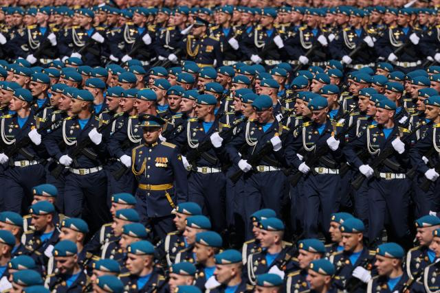 Russian servicemen march during the Victory Day military parade at Red Square in central Moscow on May 9, 2025. Russia celebrates the 80th anniversary of the Soviet Union's victory over Nazi Germany in World War Two (WWII). (Photo by STRINGER / AFP)