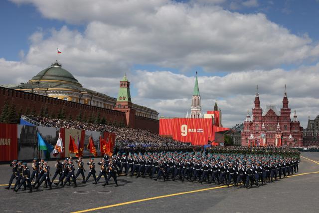 Russian servicemen march during the Victory Day military parade at Red Square in central Moscow on May 9, 2025. Russia celebrates the 80th anniversary of the Soviet Union's victory over Nazi Germany in World War Two (WWII). (Photo by STRINGER / AFP)