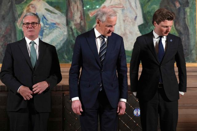 (L-R) Britain's Prime Minister Keir Starmer, Norway's Prime Minister Jonas Gahr Store and Dutch Minister of Defense Ruben Brekelmans stand next to each other during the Joint Expeditionary Force (JEF) Leaders' Summit in Oslo, Norway, on May 9, 2025. From May 8-9, Norway hosts this year's summit for the members of the JEF coalition: UK, Denmark, Estonia, Finland, Iceland, Latvia, Lithuania, the Netherlands, Sweden and Norway. Their meeting will focus on the situation in Europe and regional cooperation on security challenges. (Photo by Alastair Grant / POOL / AFP)