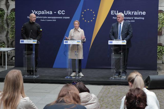 Ukrainian Prime Minister Denys Shmyhal (L), Ukrainian Minister of Foreign Affairs Andrii Sybiha (R) and EU High Representative for Foreign Affairs and Security Policy Kaja Kallas speak during a Ukraine-EU meeting in Lviv, on May 9, 2025, amid the Russian invasion of Ukraine. The EU on May 9, 2025, pledged to disburse one billion euros ($1.1 billion) from the proceeds of frozen Russian assets to Ukrainian arms companies as part of its support to Kyiv as it fights off Moscow's invasion. (Photo by Sergii VOLSKYI / AFP)