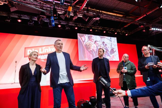 Ines Schwerdtner, co-leader of Germany's The Left (Die Linke) party, and Jan van Aken, co-leader of Germany's The Left (Die Linke) party are pictured prior to the start of the federal party congress in Chemnitz, eastern Germany on May 9, 2025. (Photo by JENS SCHLUETER / AFP)