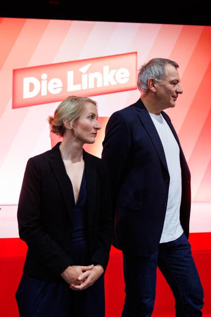 Ines Schwerdtner, co-leader of Germany's The Left (Die Linke) party, and Jan van Aken, co-leader of Germany's The Left (Die Linke) party are pictured prior to the start of the federal party congress in Chemnitz, eastern Germany on May 9, 2025. (Photo by JENS SCHLUETER / AFP)