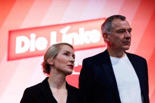 Ines Schwerdtner, co-leader of Germany's The Left (Die Linke) party, and Jan van Aken, co-leader of Germany's The Left (Die Linke) party are pictured prior to the start of the federal party congress in Chemnitz, eastern Germany on May 9, 2025. (Photo by JENS SCHLUETER / AFP)