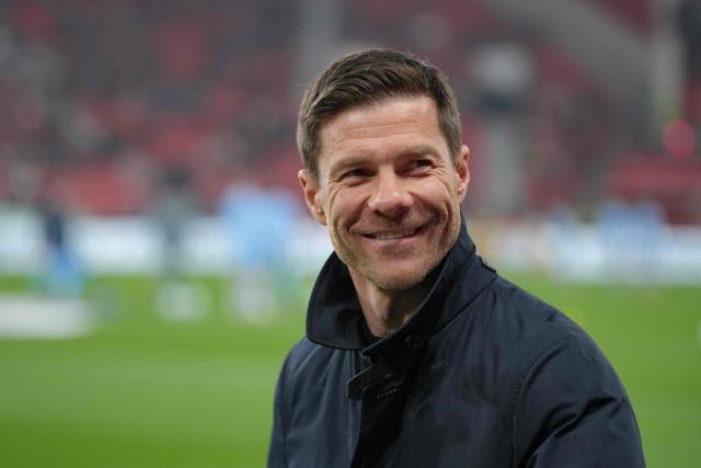 (FILES) Bayer Leverkusen's Spanish head coach Xabi Alonso arrives prior to the German first division Bundesliga football match between Bayer 04 Leverkusen and VfL Bochum in Leverkusen, western Germany on March 28, 2025. Bayer Leverkusen coach Xabi Alonso confirmed on May 9, 2025 he will leave the club at the end of the season, amid reports linking him to Spanish giants Real Madrid. (Photo by Pau BARRENA / AFP) / DFL REGULATIONS PROHIBIT ANY USE OF PHOTOGRAPHS AS IMAGE SEQUENCES AND/OR QUASI-VIDEO