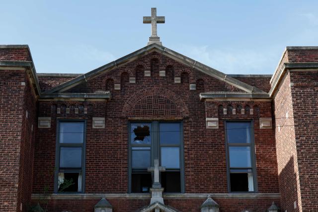 The exterior of the St. Mary of the Assumption Catholic Church, where Pope Leo XIV, Robert Francis Prevost, used to attend while growing up, is seen in Dolton, Illinois, on May 9, 2025. Robert Francis Prevost became the first pope from the United States on May 8, 2025, picking the papal name Leo XIV after cardinals from around the world elected him leader of the world's 1.4 billion Catholics. Tens of thousands of people packed in St Peter's Square cheered as Prevost appeared on the balcony of St Peter's Basilica, waving with both hands, smiling and bowing. (Photo by KAMIL KRZACZYNSKI / AFP)