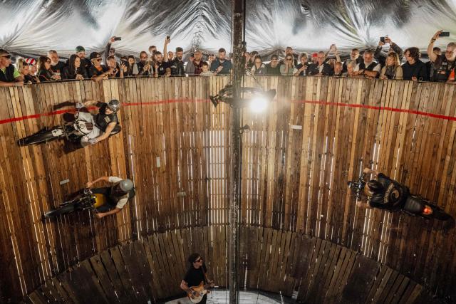 Bikers ride the "Wall of death" attraction during the Harley-Davidson Euro 2025 Festival near Grimaud, southern France, on May 9, 2025. (Photo by Frederic DIDES / AFP)